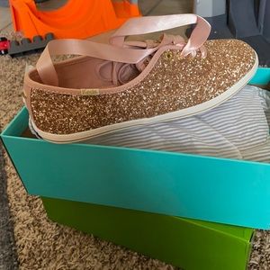 Rose gold with sparkles.